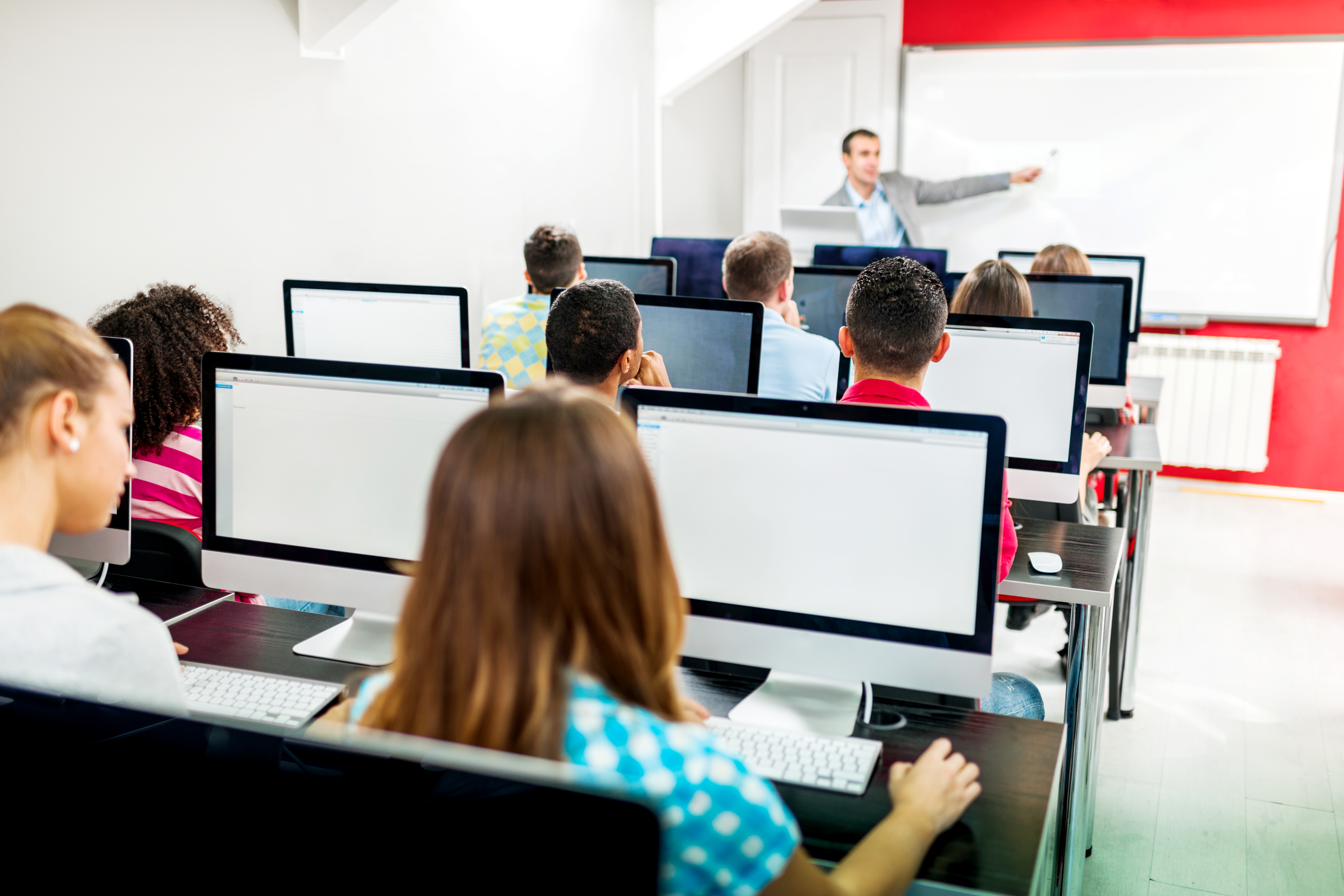 People in a computer seminar.